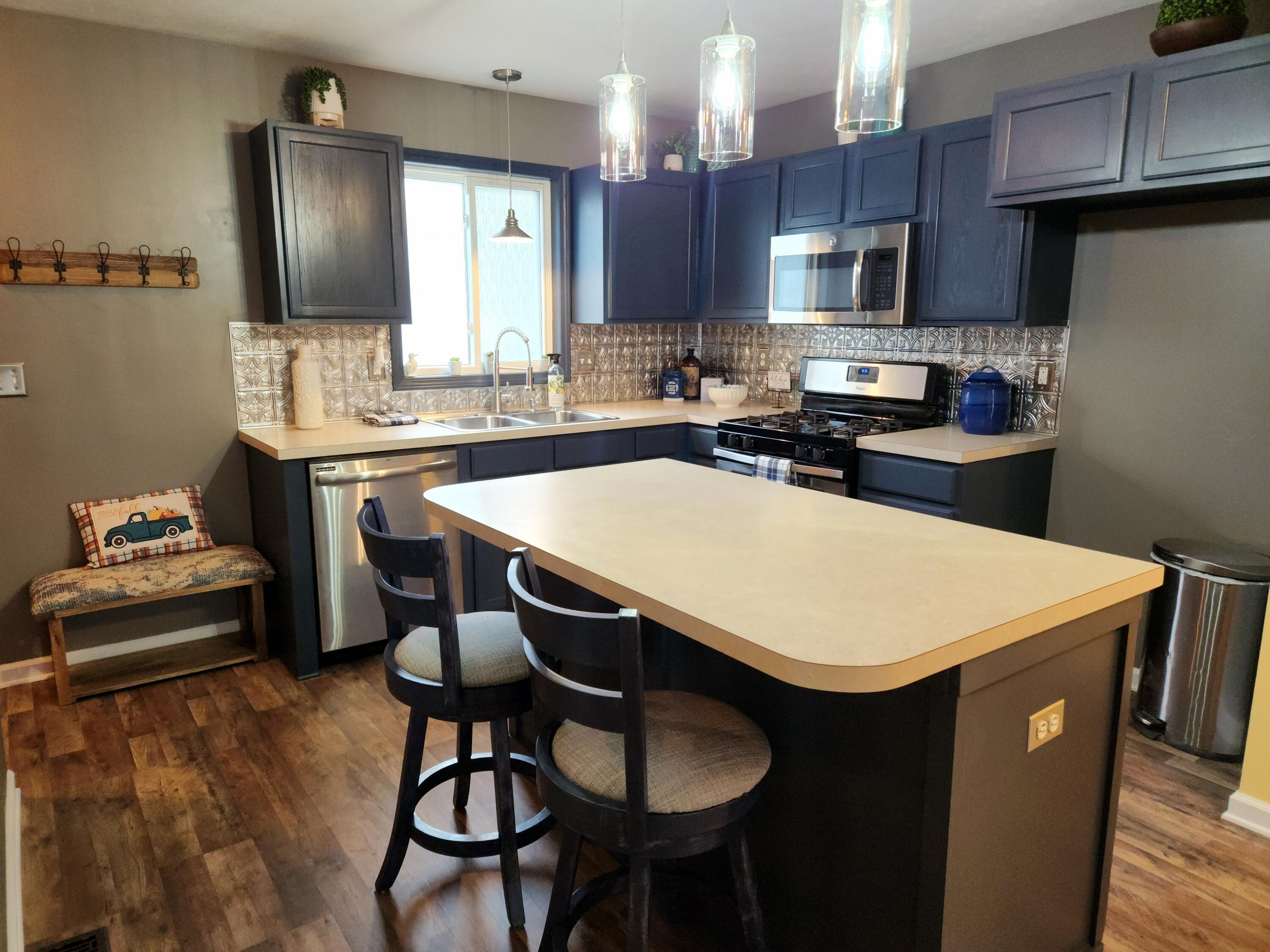 136 Irving Road, Unit 3 Middleville, MI 49333 - Photo 3 of 31 20231015_171255