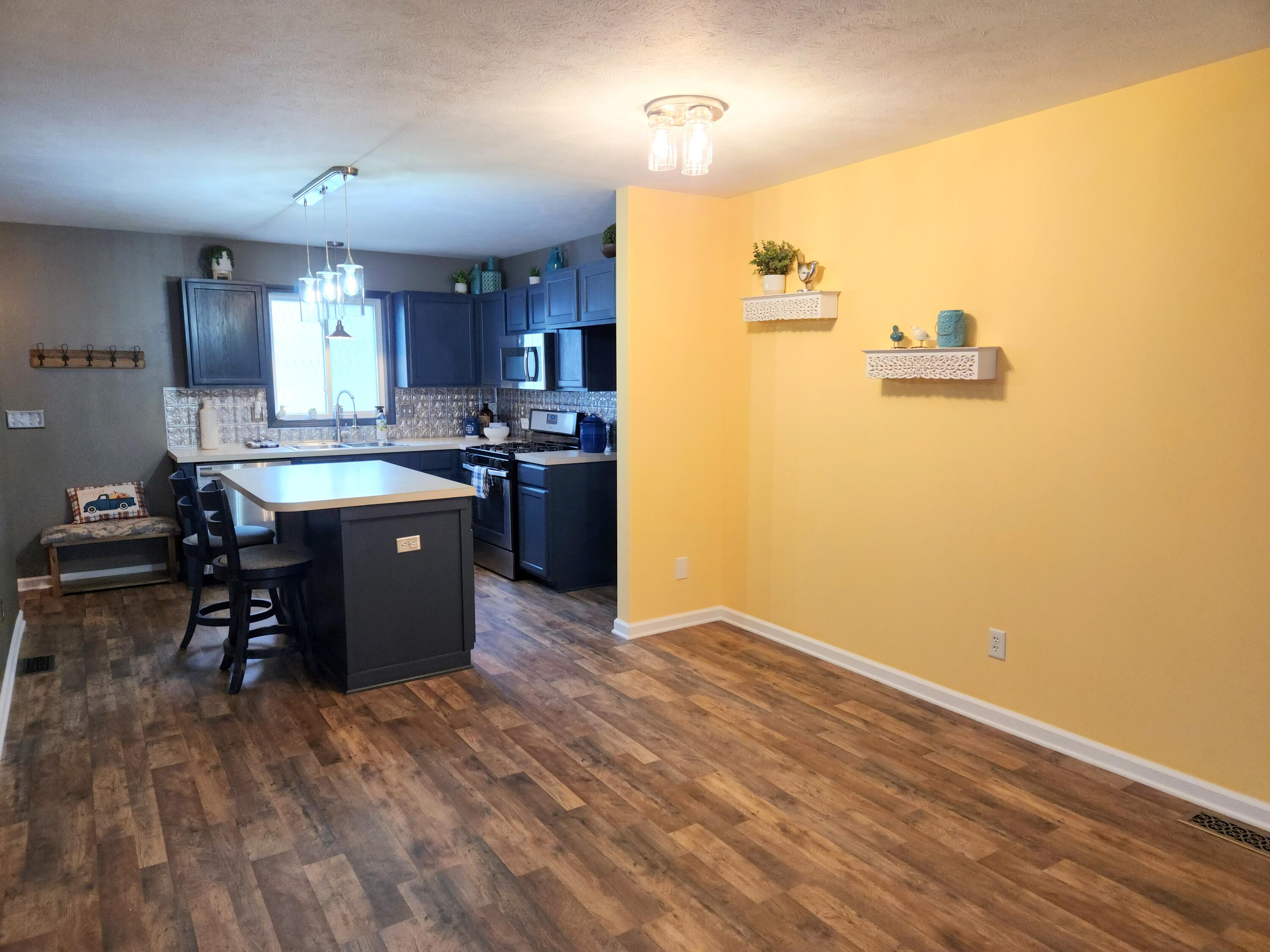 136 Irving Road, Unit 3 Middleville, MI 49333 - Photo 8 of 31 20231015_171323