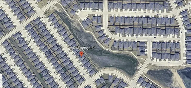 a view of a bench in wooden deck