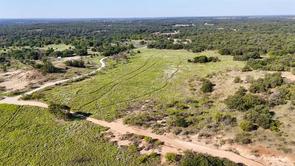 a view of a houses with a yard
