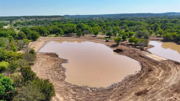 a view of a backyard of a house