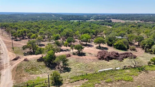 a view of a big yard with green space
