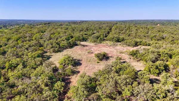 a view of a yard with an outdoor space