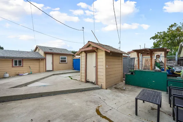 a view of a house with a patio