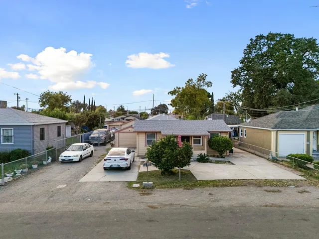 a car parked in front of a house