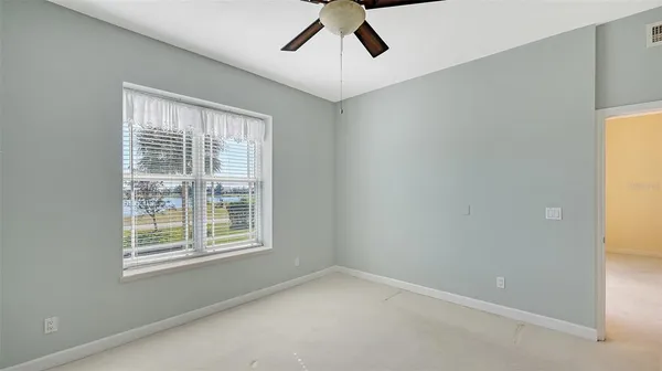 an aerial view of residential building with outdoor space and ocean view