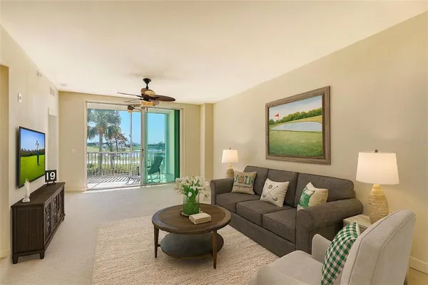 a view of empty room with cabinet and floor to ceiling window