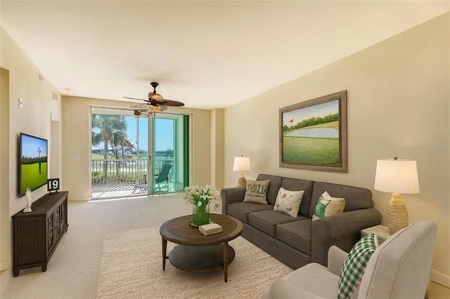 a view of empty room with cabinet and floor to ceiling window
