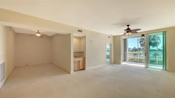 a view of a room with a large window