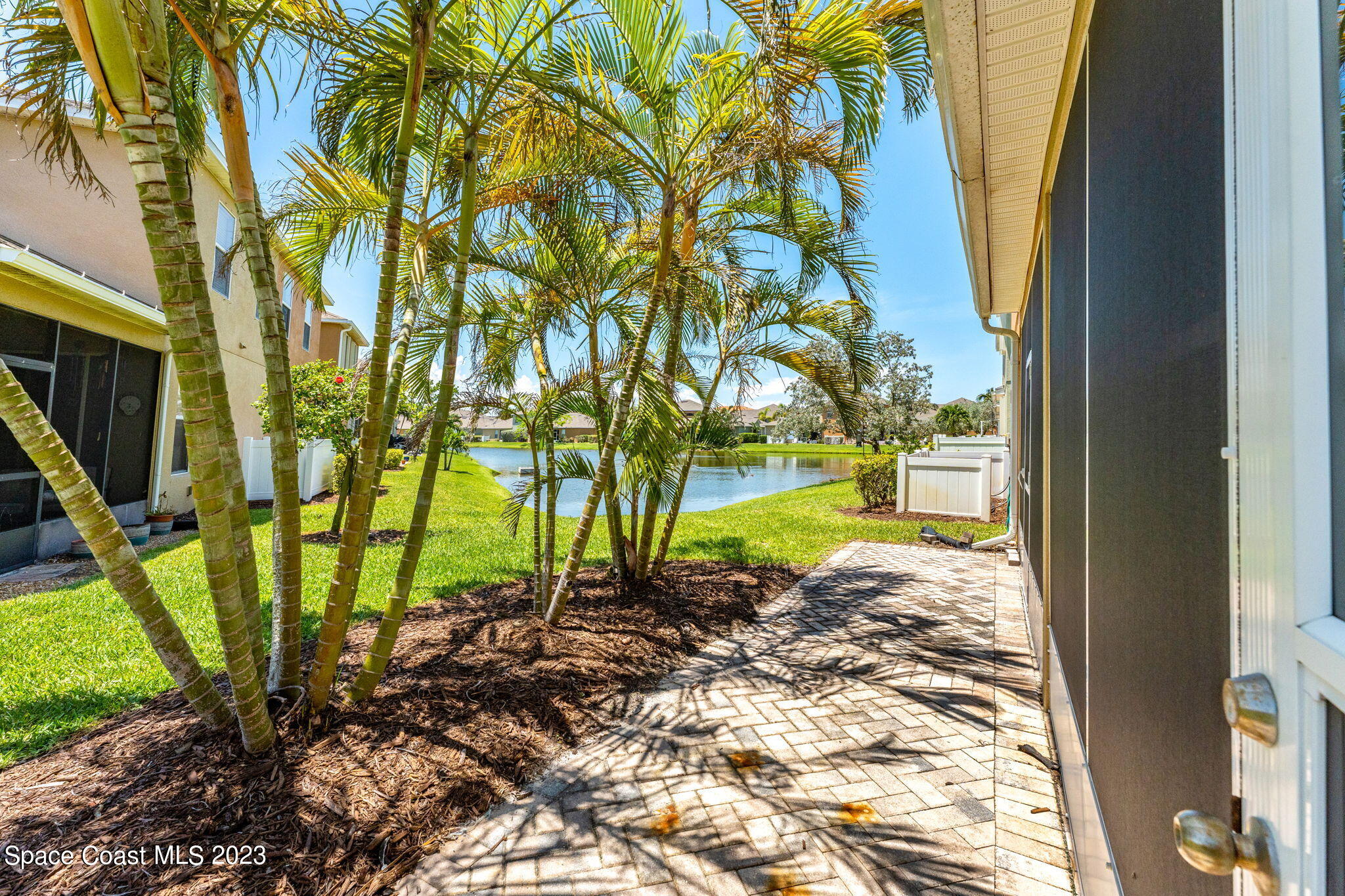 3310 Titanic Circle Indialantic, FL 32903 - Photo 16 of 25 a view of swimming pool from a yard