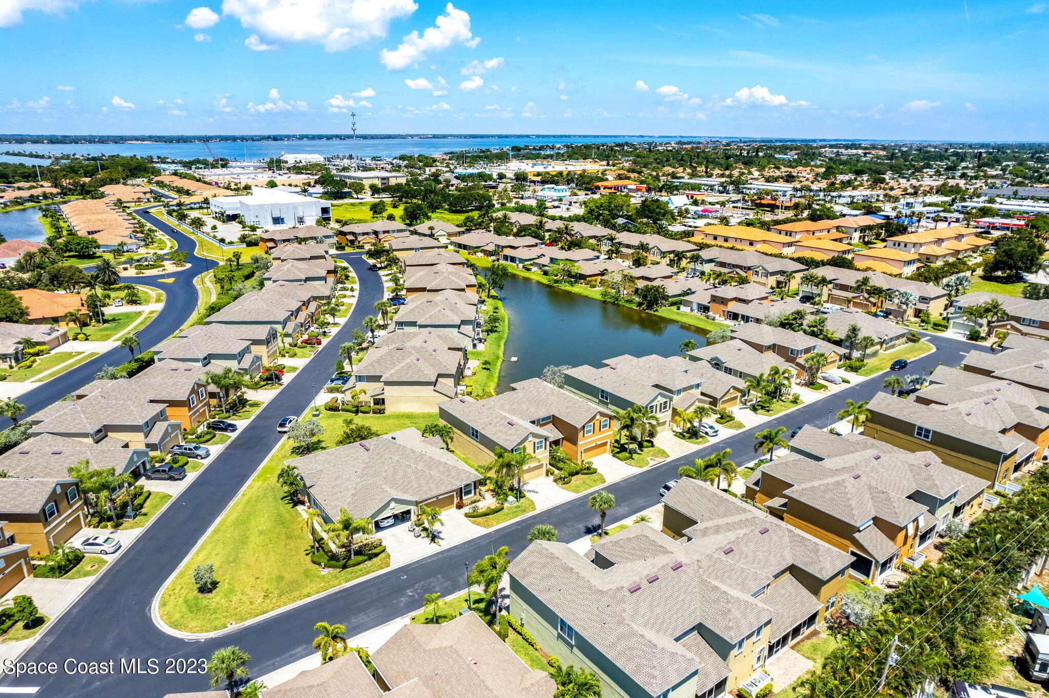 3310 Titanic Circle Indialantic, FL 32903 - Photo 22 of 25 an aerial view of residential houses with outdoor space and ocean view