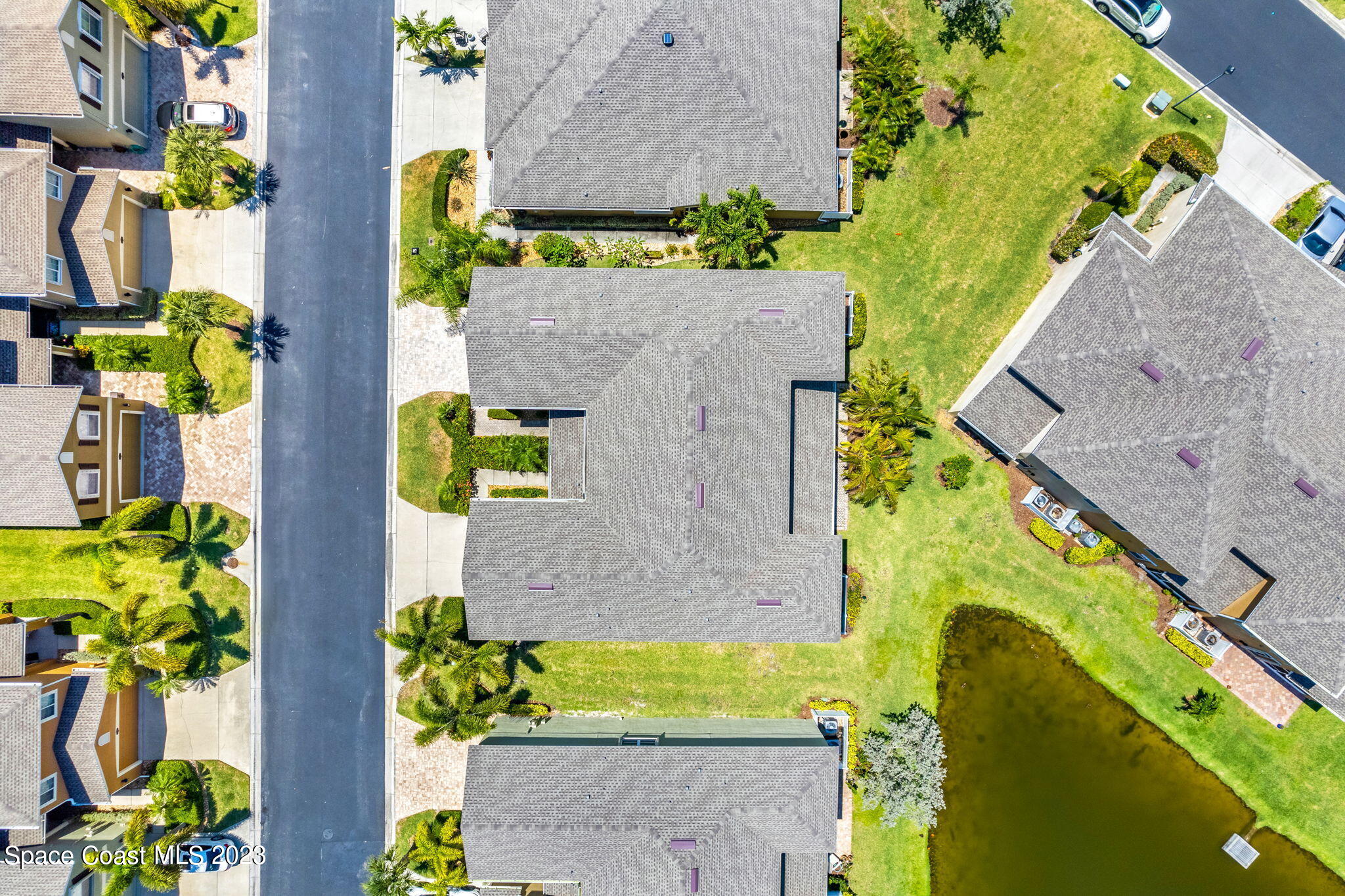3310 Titanic Circle Indialantic, FL 32903 - Photo 23 of 25 an aerial view of residential house with outdoor space and swimming pool