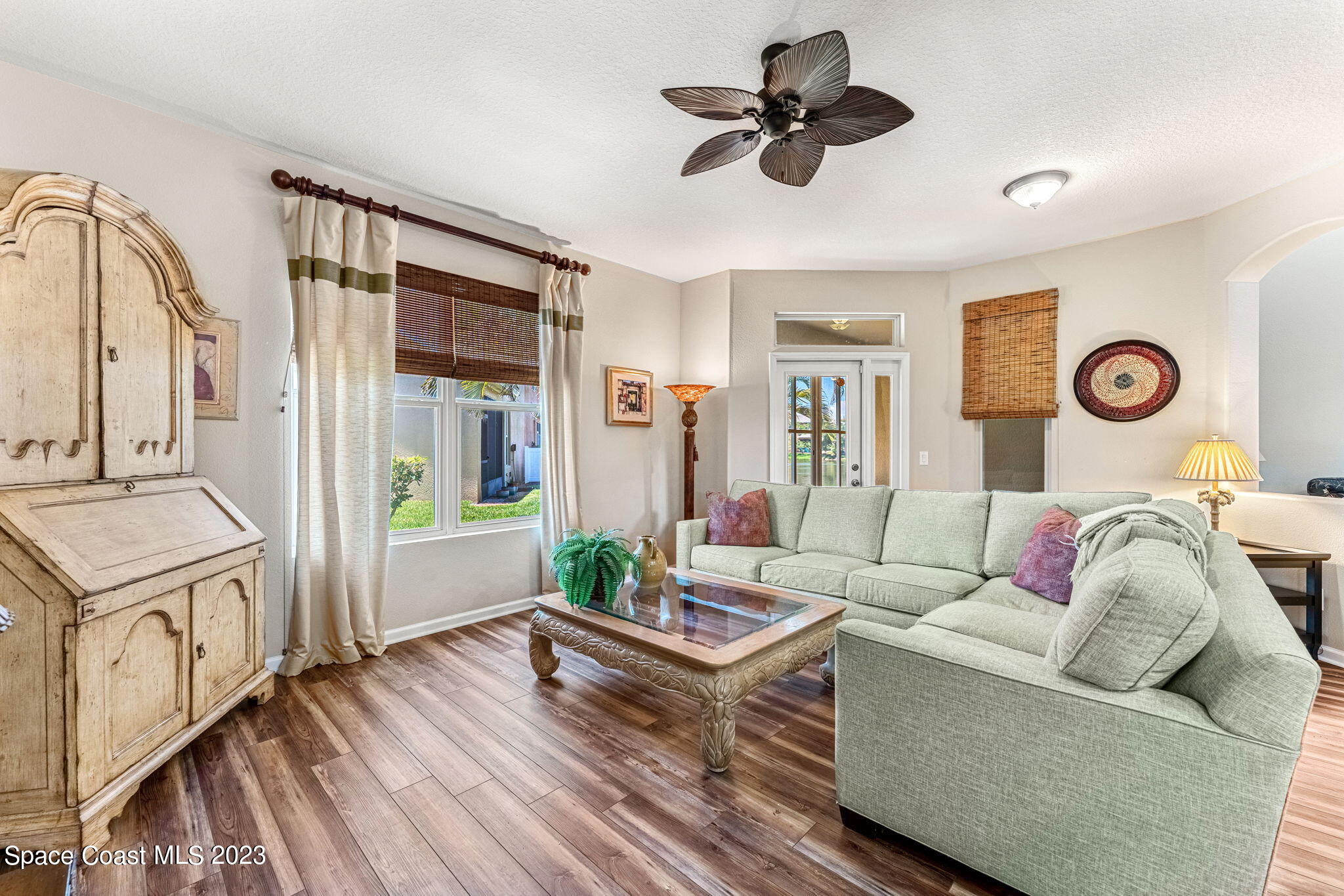 3310 Titanic Circle Indialantic, FL 32903 - Photo 3 of 25 a living room with furniture and a window