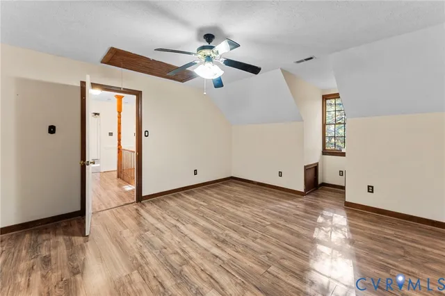 a kitchen with stainless steel appliances granite countertop a stove sink and cabinets