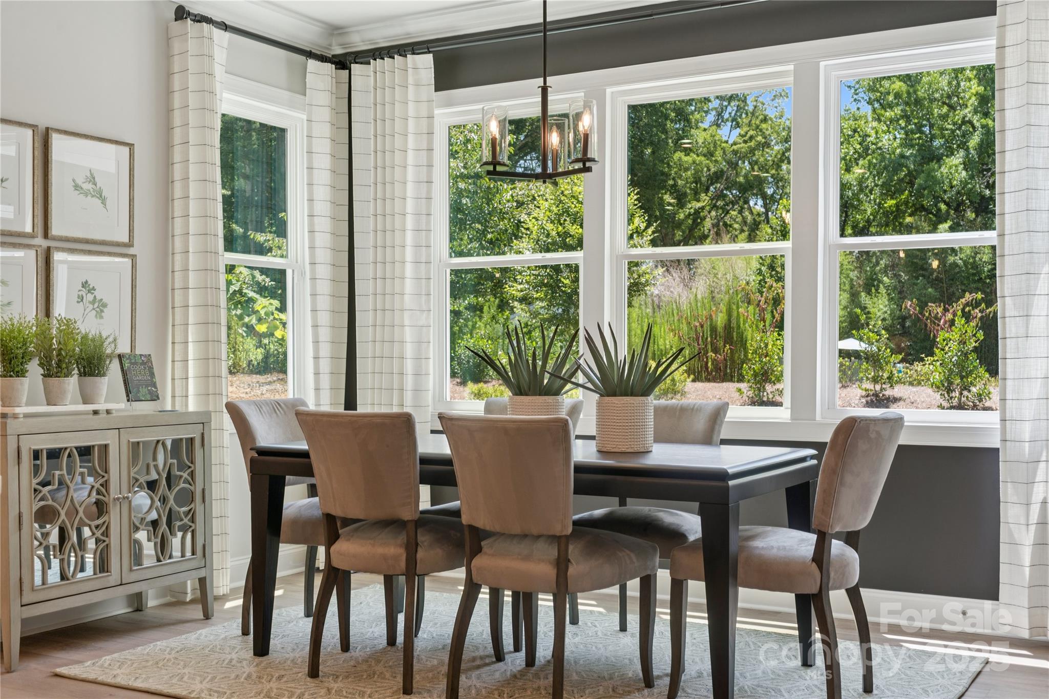 136 Balboa Street Matthews, NC 28104 - Photo 15 of 47 a view of a dining room with furniture window and outside view