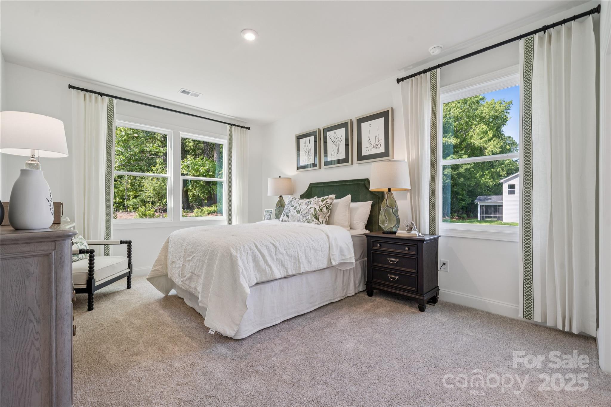 136 Balboa Street Matthews, NC 28104 - Photo 19 of 47 a bedroom with a bed and a window