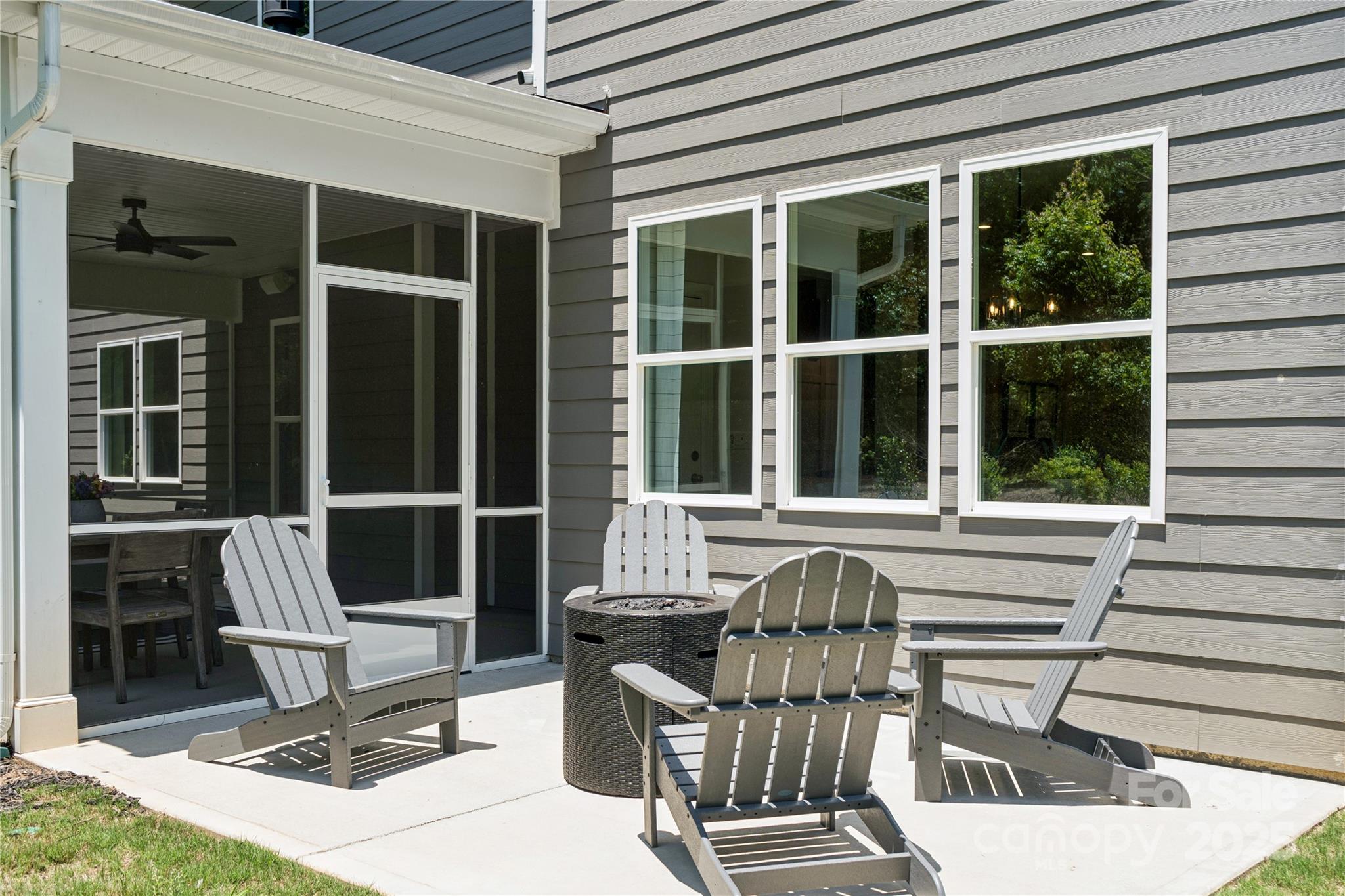 136 Balboa Street Matthews, NC 28104 - Photo 2 of 47 a view of a chair and table in the balcony