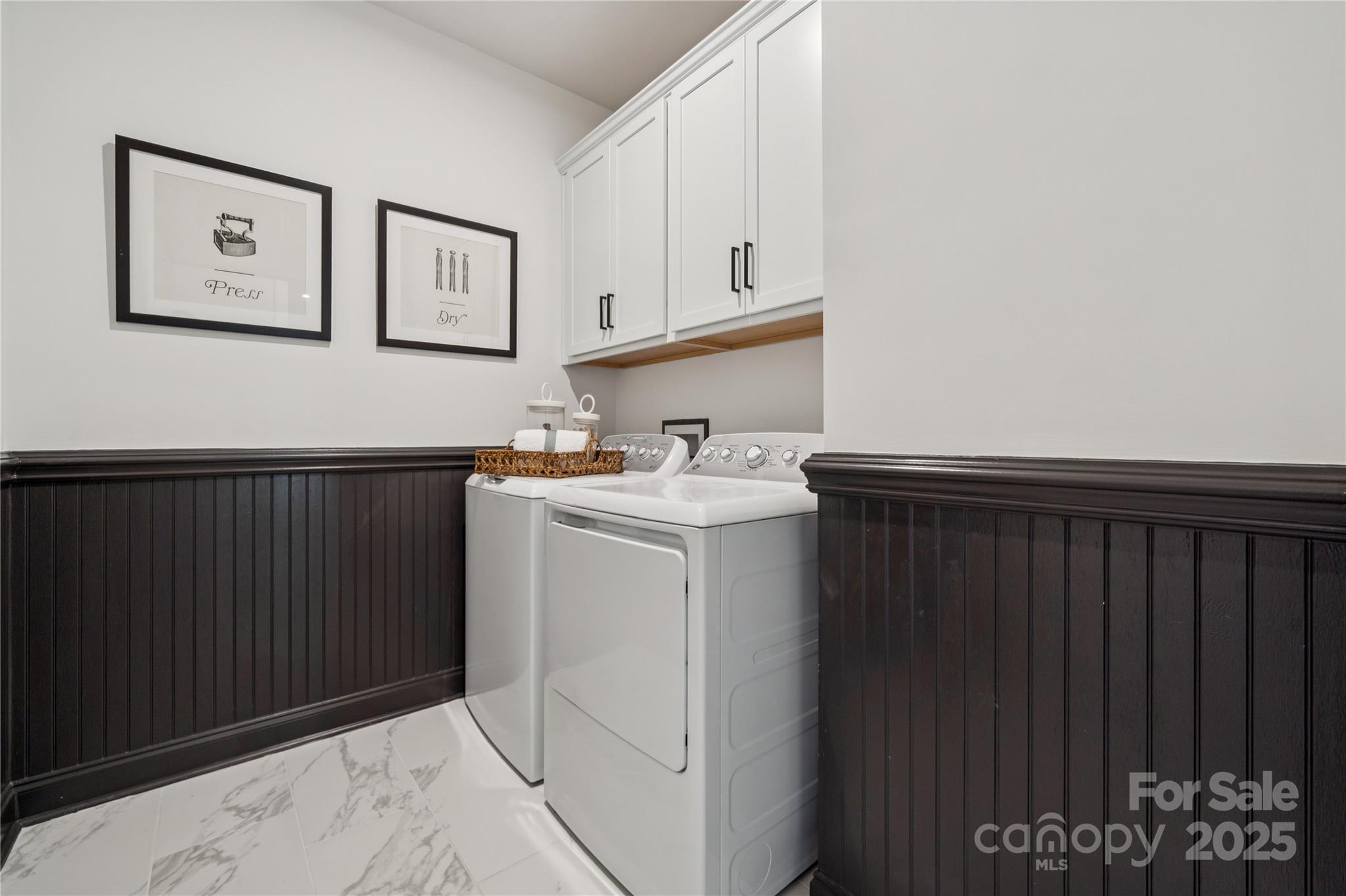 136 Balboa Street Matthews, NC 28104 - Photo 26 of 47 a utility room with dryer and washer