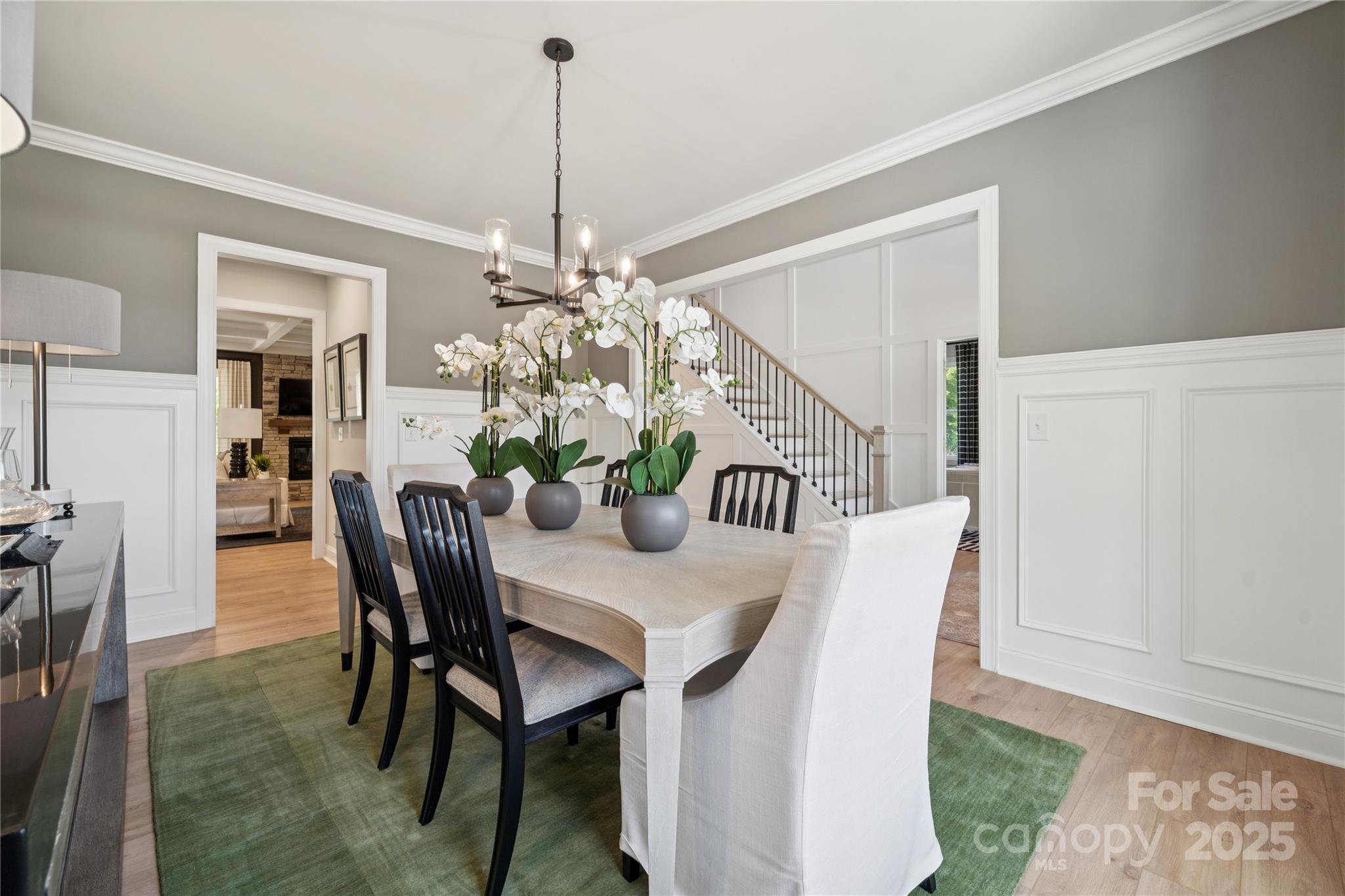 136 Balboa Street Matthews, NC 28104 - Photo 30 of 47 a view of a dining room with furniture and chandelier