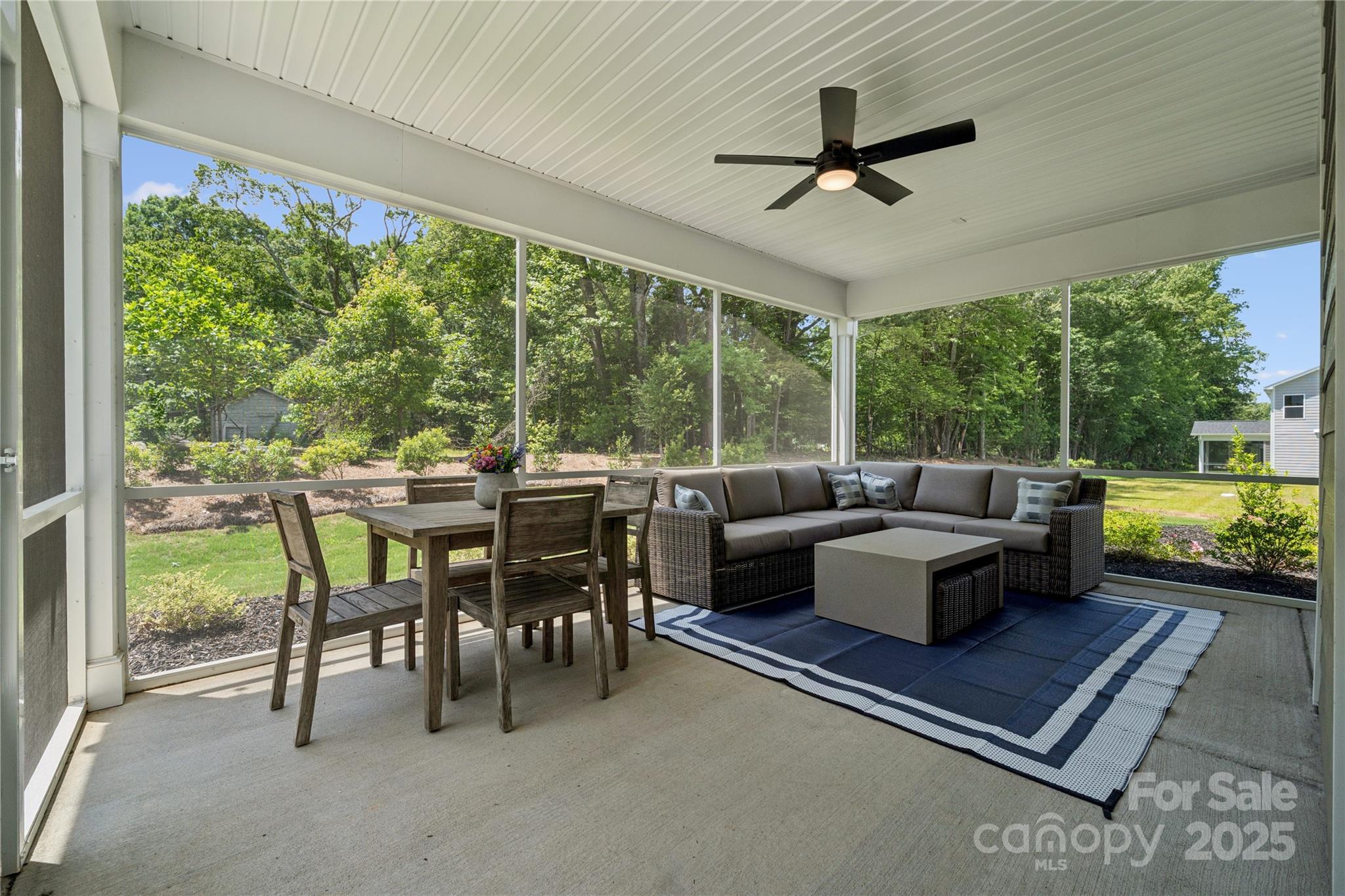 136 Balboa Street Matthews, NC 28104 - Photo 3 of 47 a living room with furniture and a large window