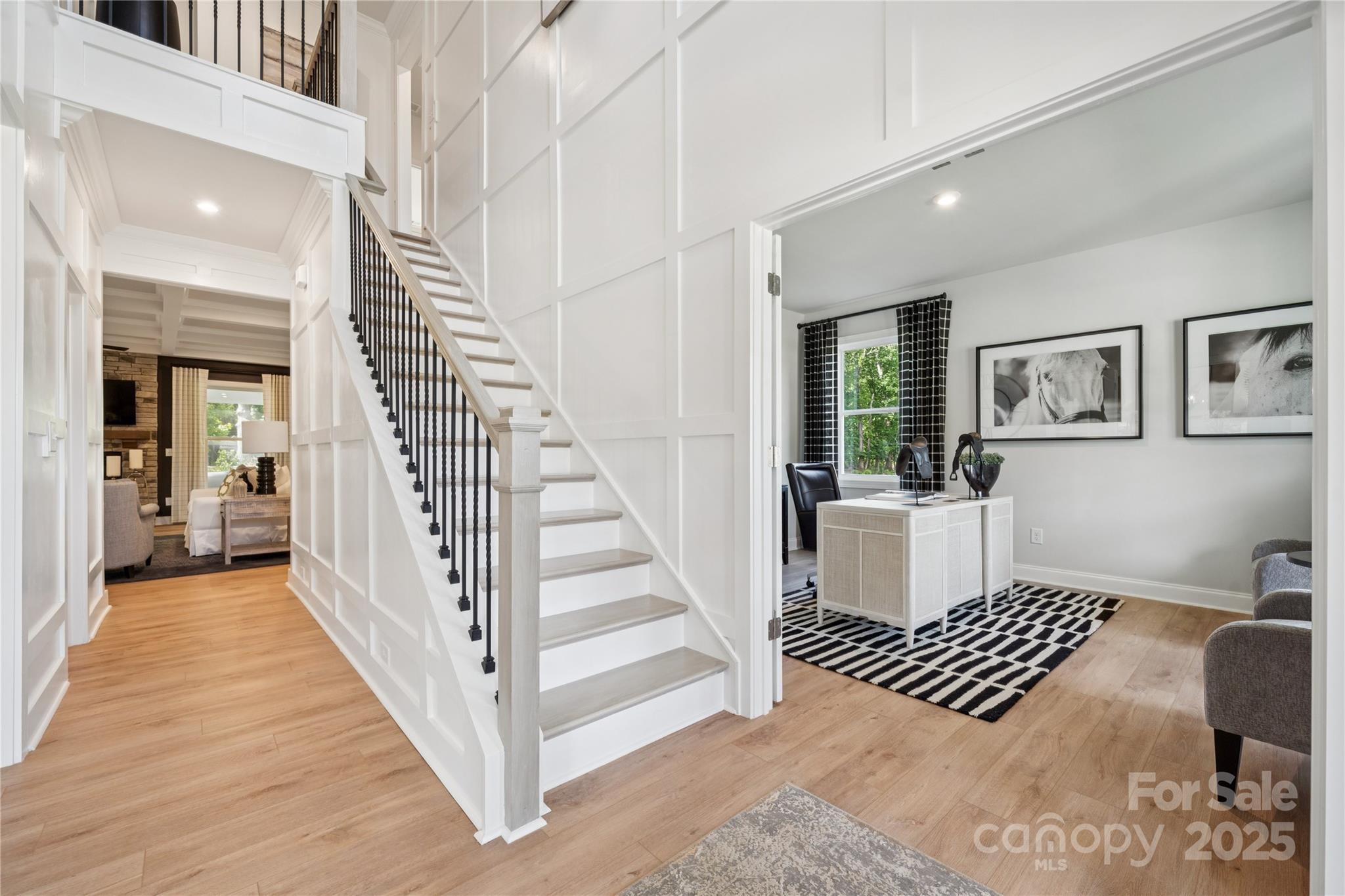 136 Balboa Street Matthews, NC 28104 - Photo 40 of 47 a view of entryway with wooden floor and windows