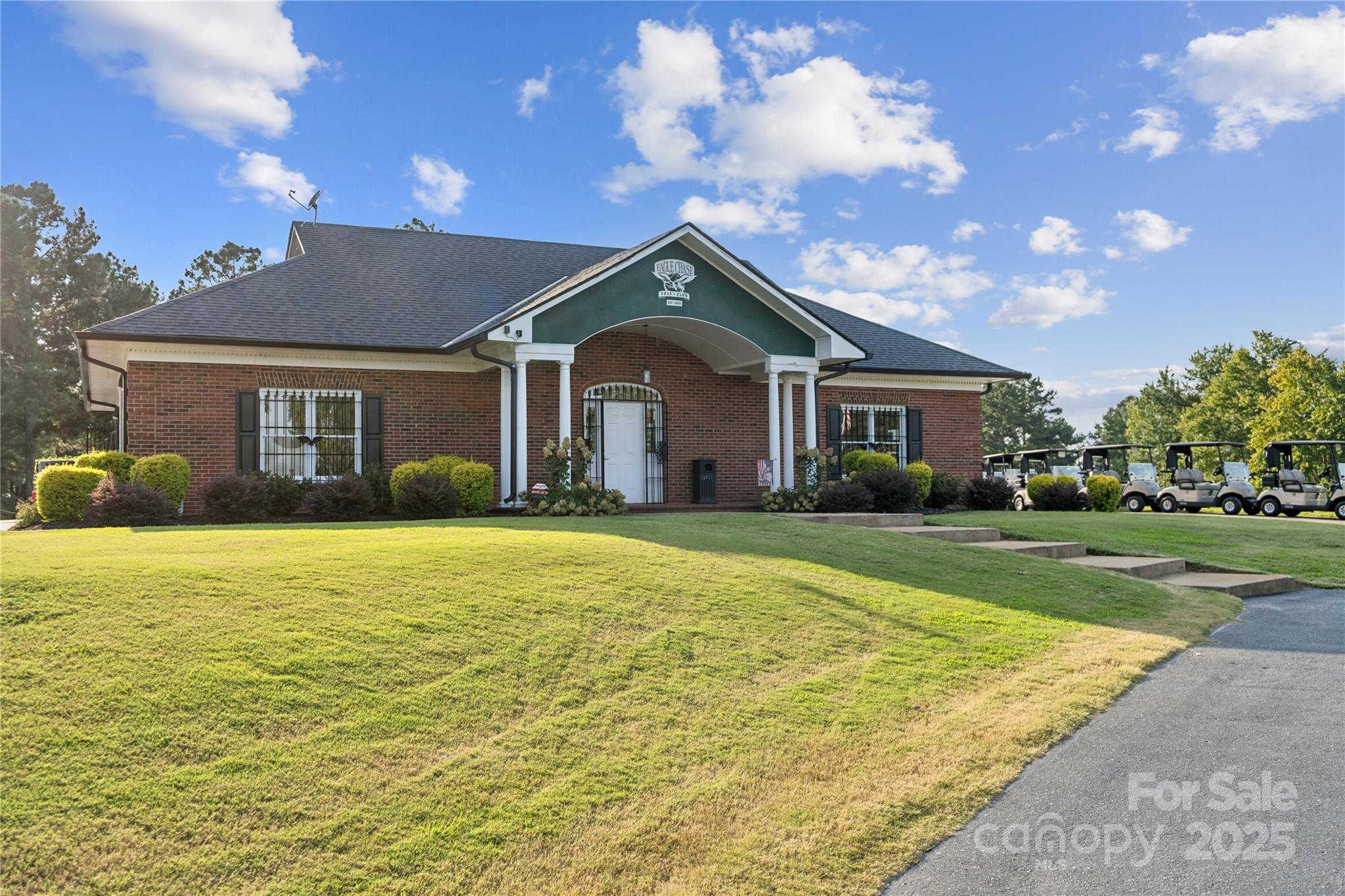136 Balboa Street Matthews, NC 28104 - Photo 44 of 47 a front view of a house with garden