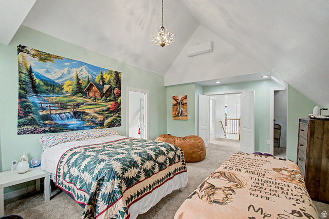 12645 East Cedar Ridge Drive Fairview, UT 84629 - Photo 12 of 34 Vaulted ceiling room featuring light green walls, a crystal chandelier, recessed lighting, and a ductless mini-split system