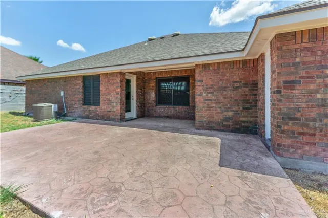 a house view with a backyard space