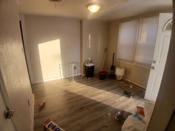 a view of a storage & utility room with a sink