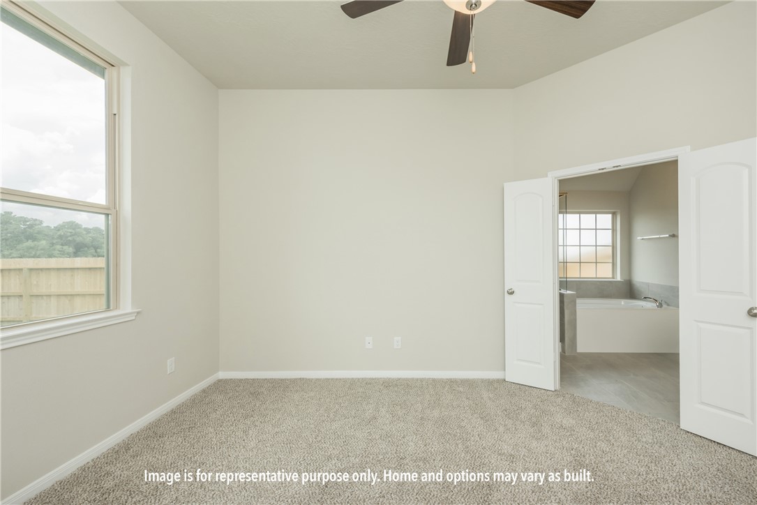 2422 Rooke Road Bryan, TX 77807 - Photo 6 of 12 a view of an empty room and window