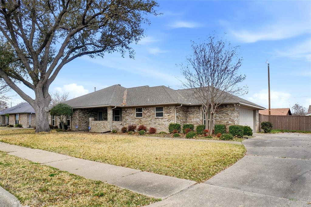 3401 Colonial Drive Rowlett, TX 75088 - Photo 1 of 1 a front view of a house with a yard