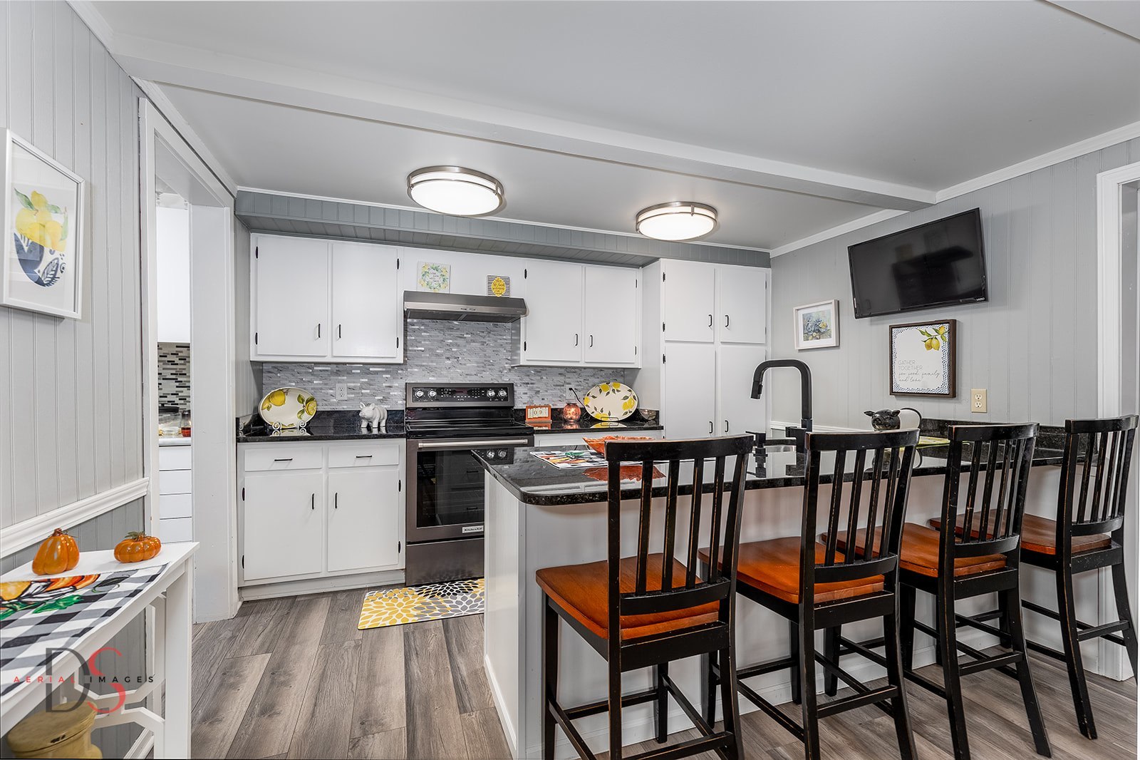 527 East Main Street Ottawa, IL 61350 - Photo 17 of 44 a kitchen with stainless steel appliances granite countertop a stove a sink and a refrigerator