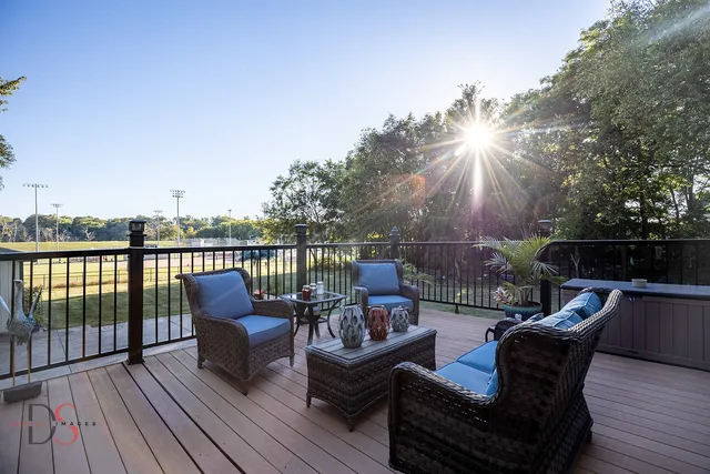 a view of a roof deck with couches