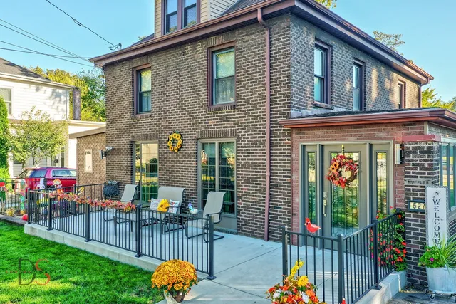 a front view of a house with patio