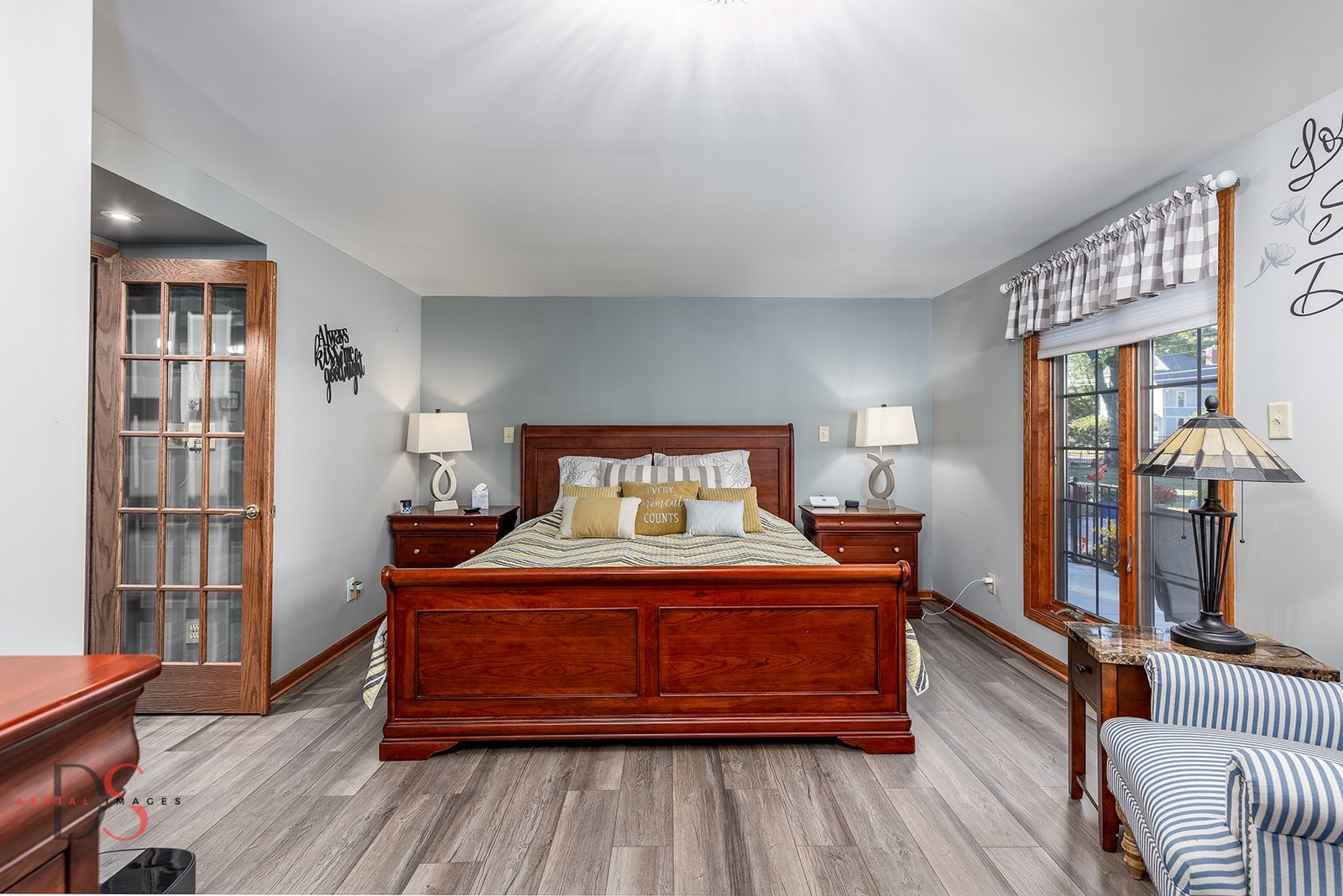 527 East Main Street Ottawa, IL 61350 - Photo 10 of 44 a bedroom with a bed and wooden floor