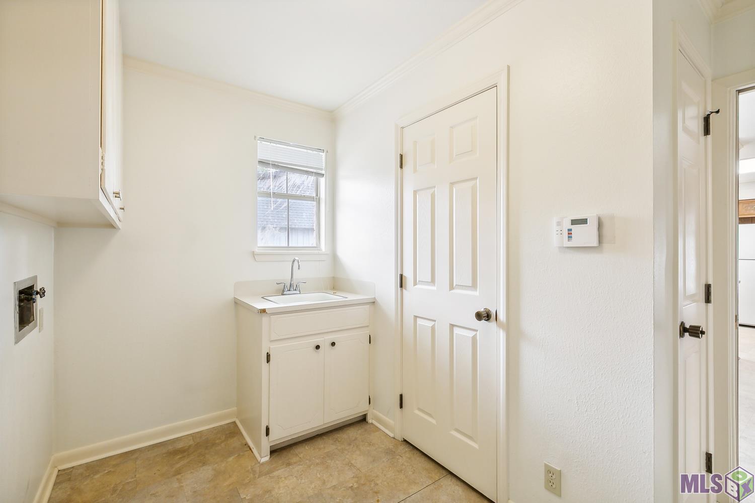 12829 Deerpath Way Baton Rouge, LA 70816 - Photo 17 of 24 1/2 Bath in Utility RM