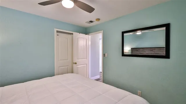 a bathroom with a toilet sink and shower