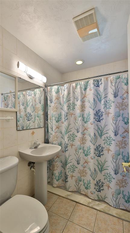 8 Ocean Dunes Drive Ormond Beach, FL 32176 - Photo 15 of 55 a bathroom with a sink and a toilet