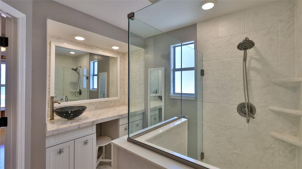 8 Ocean Dunes Drive Ormond Beach, FL 32176 - Photo 28 of 55 a bathroom with a granite countertop sink a toilet and shower