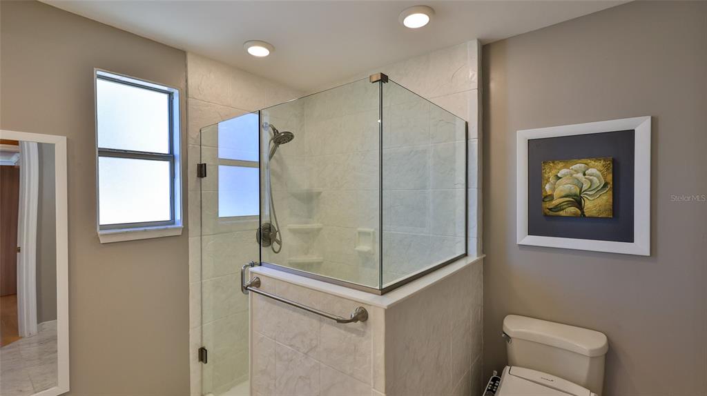 8 Ocean Dunes Drive Ormond Beach, FL 32176 - Photo 29 of 55 a bathroom with a shower and a toilet