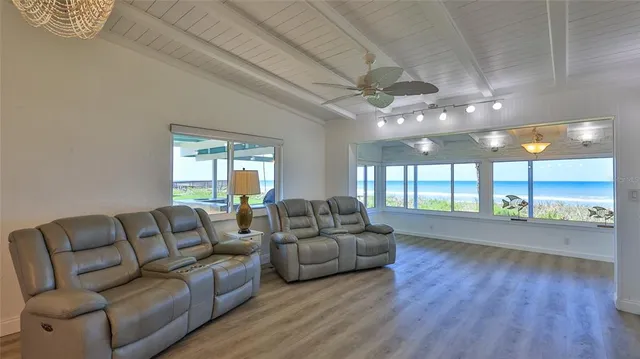 a view of a two chairs in the patio