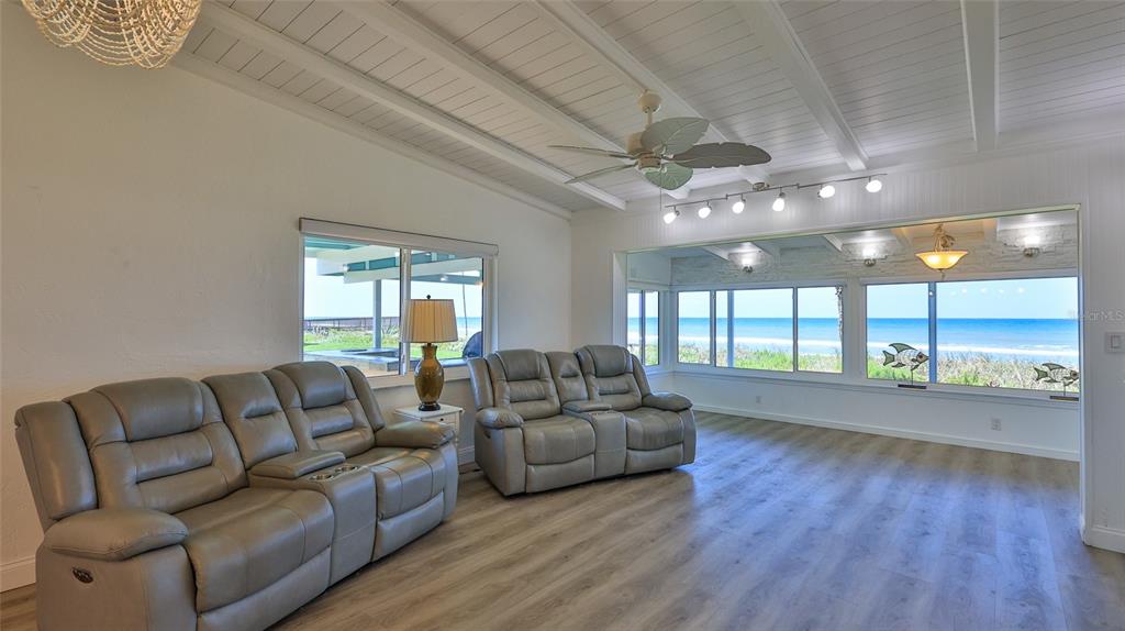 8 Ocean Dunes Drive Ormond Beach, FL 32176 - Photo 35 of 55 a living room with furniture and a large window