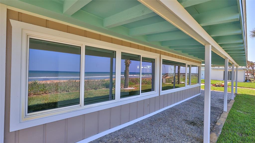 8 Ocean Dunes Drive Ormond Beach, FL 32176 - Photo 40 of 55 a view of a house with a swimming pool