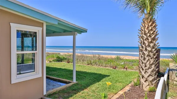a view of beach and ocean