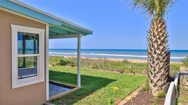 a view of beach and ocean