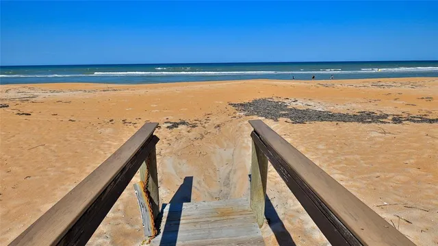 a view of a lake with a beach
