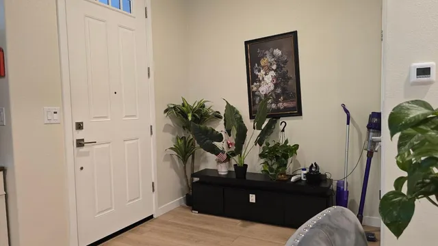 a kitchen with stainless steel appliances granite countertop a stove and a microwave