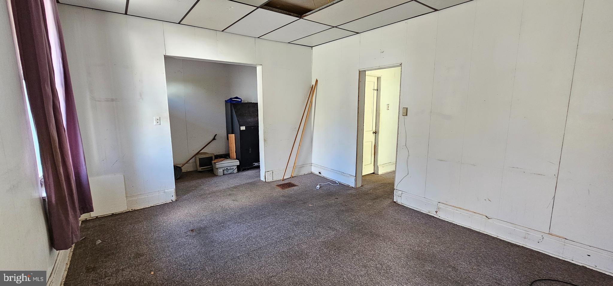 922-924 Von Lunen Road Johnstown, PA 15902 - Photo 11 of 54 a view of a room with a hallway and wooden shelves