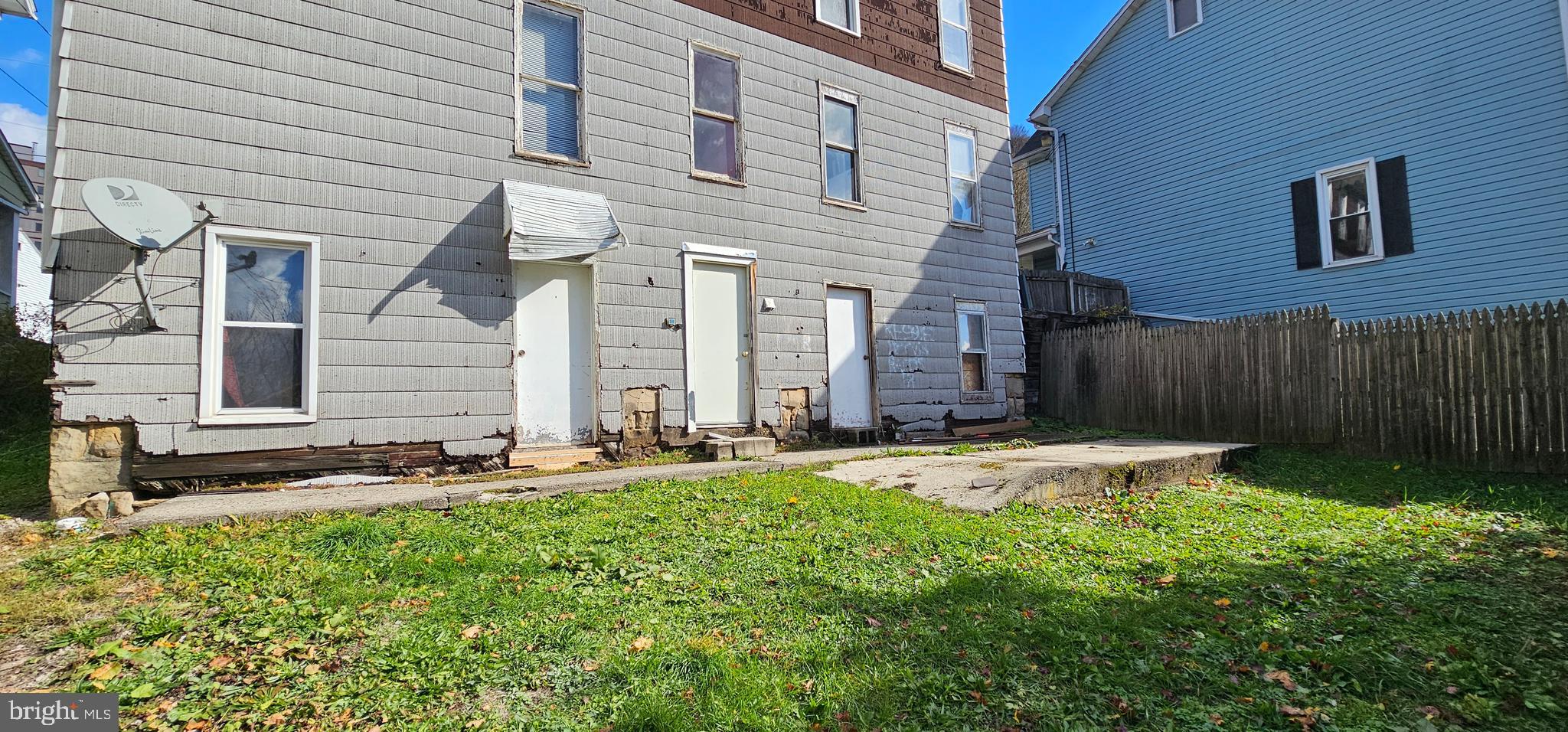 922-924 Von Lunen Road Johnstown, PA 15902 - Photo 2 of 54 a bathroom with a sink and a large mirror