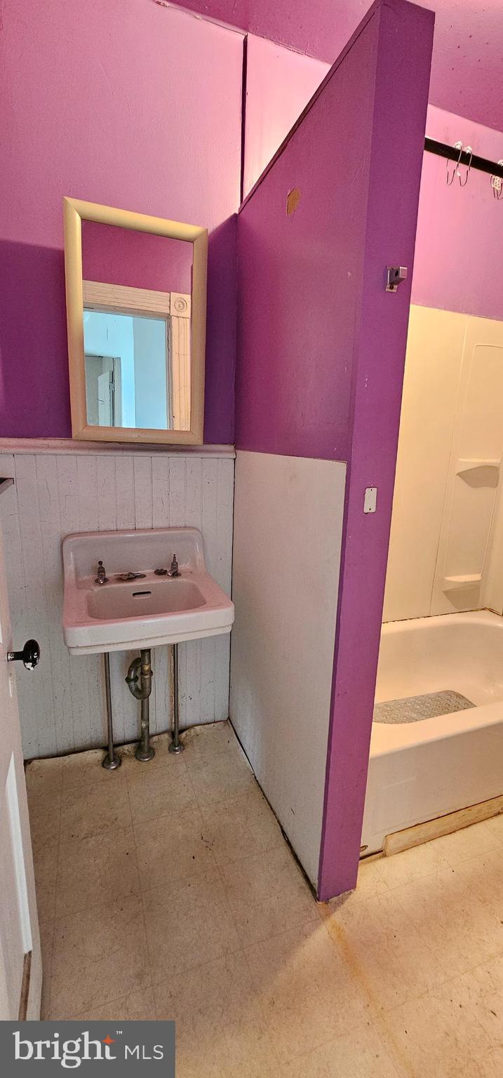 922-924 Von Lunen Road Johnstown, PA 15902 - Photo 25 of 54 a bathroom with a sink and a mirror